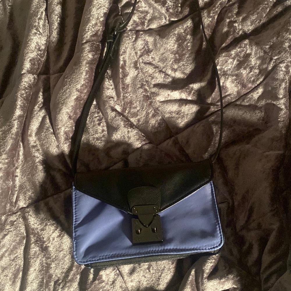 This is a Nemans Marcus purse I was given it has never been worn .